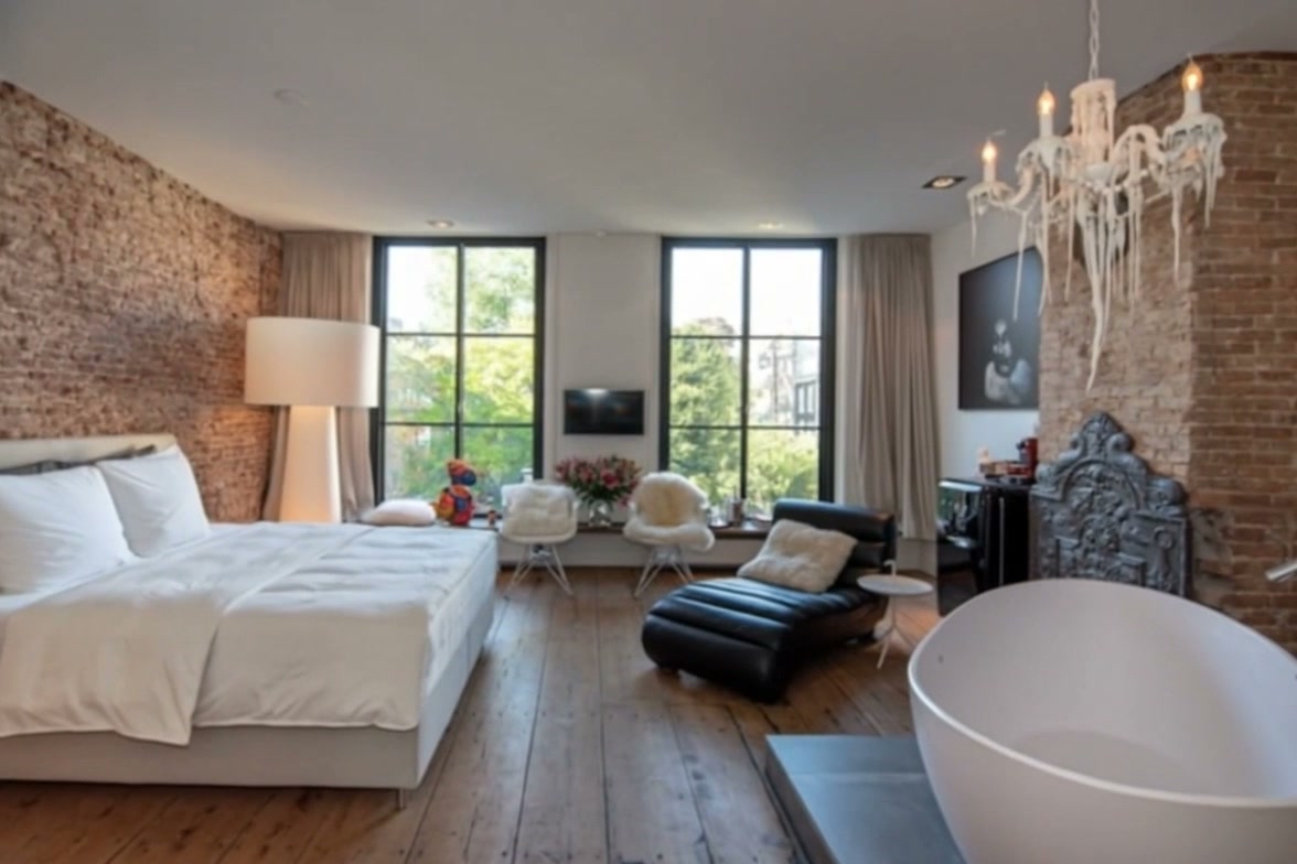 Wolvenstraat 16 — twee suites overzicht hero (Higgsfield W-HERO-V2)